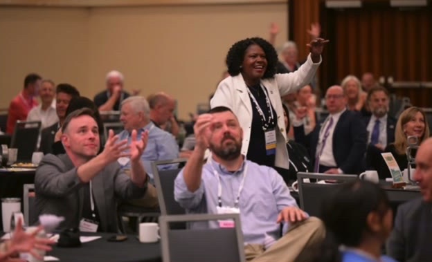 Lenders and partners cheer at the NADCO Summit in Washington, DC